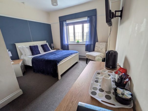 Very large bedroom with double bed, tea and coffee making facilities and stunning views.