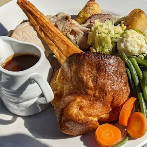 roast dinner with a jug of gravy